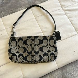 Grey signature coach wristlet. Barely used.